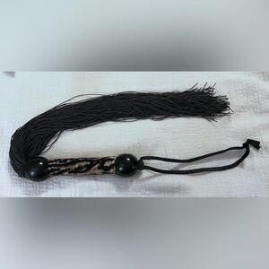 Adult Whip flogger with animal print handle.  New.